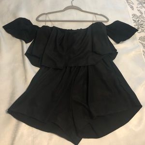 Puffy black over the shoulder romper